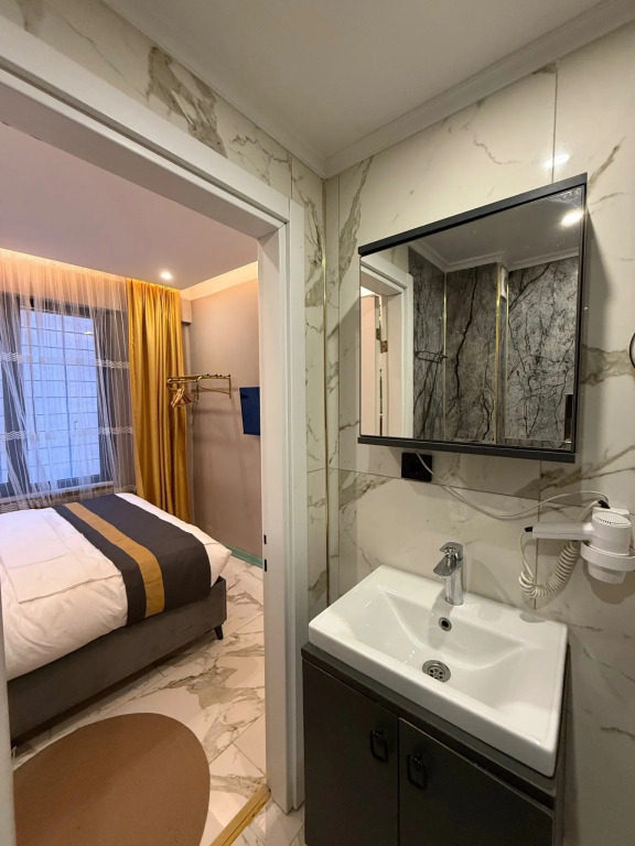 Апартаменты Warm cozy studio near the metro station