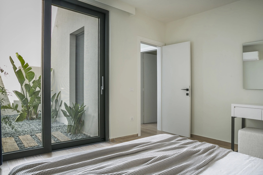 Апартаменты Oikos Boutique Residences