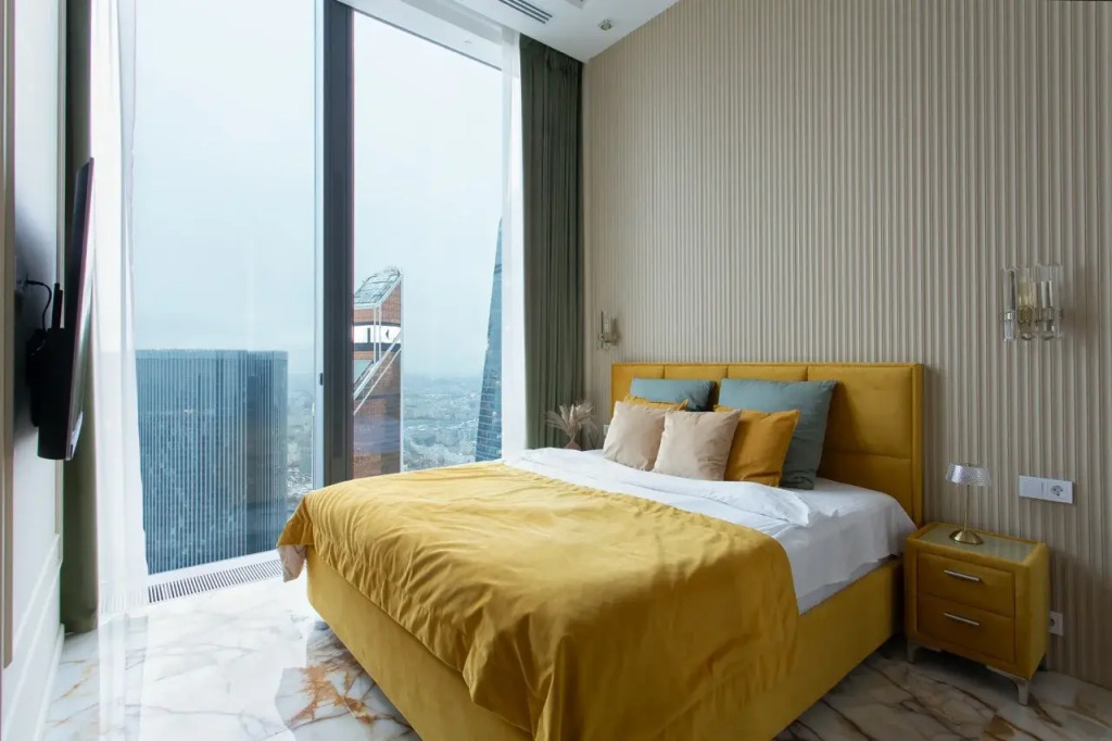 Апартаменты Sky City Moscow пентхаус-формат на 64 этаже: оникс, подсветка, панорамные окна Уникальный вид на башни и город