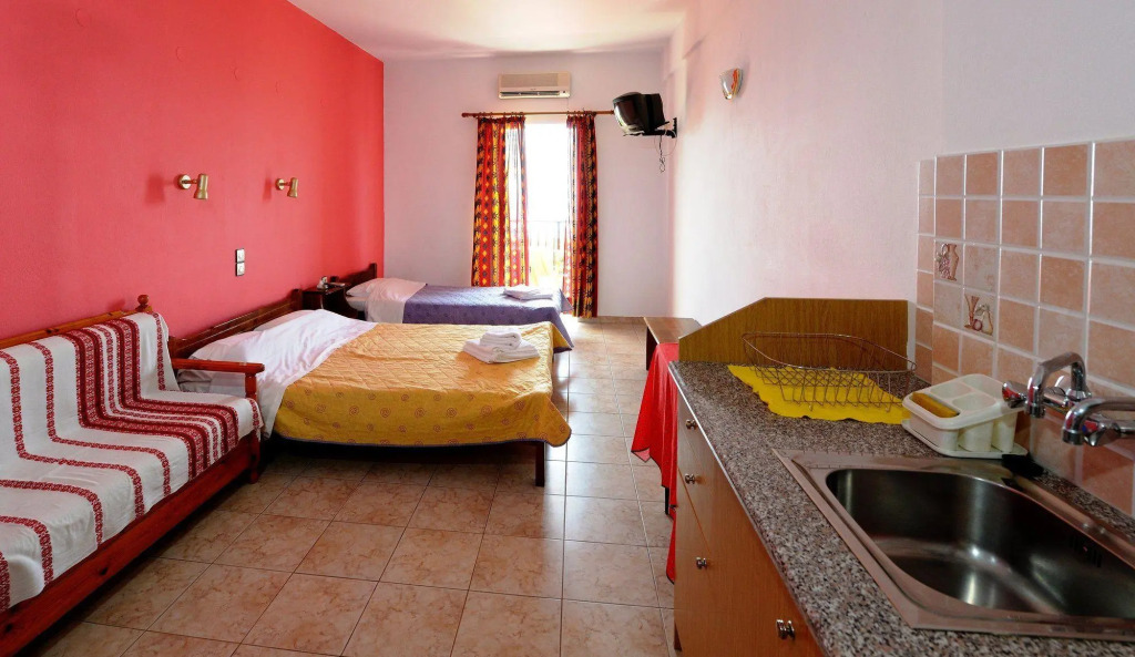 Отель Pharos Rooms