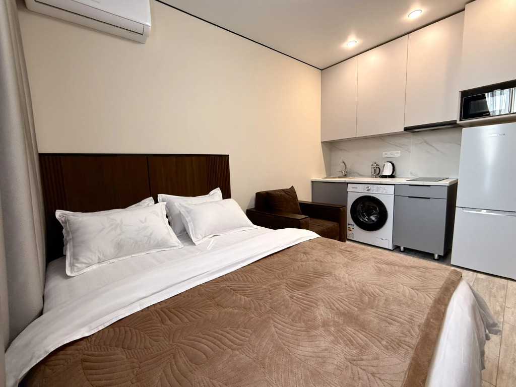Квартира студия Raiymbek residence 18-26-2 & питьевая вода в подарок