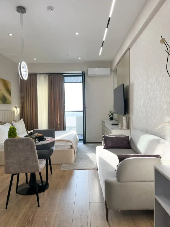 Апартаменты Уютная студия в центре Ташкента NRG U-Tower 18 этаж (310)