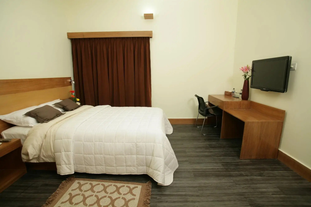 Отель Richmond Hotel & Suites