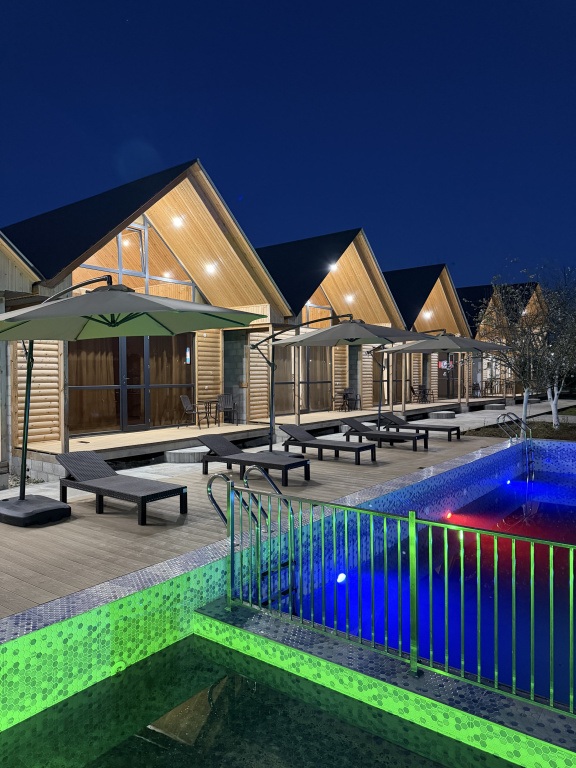 Курортный отель Akhan Resort Gagra - Виллы у реки с видом на горы возле моря