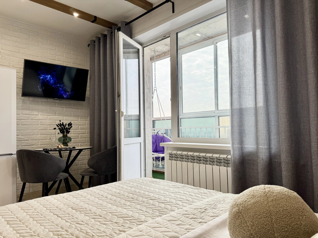 Квартира Атмосфера Сна Loft в 50 метрах над землёй с качелей