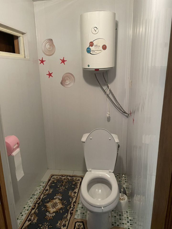 Частный дом Уютный домик у красавца эвкалипта