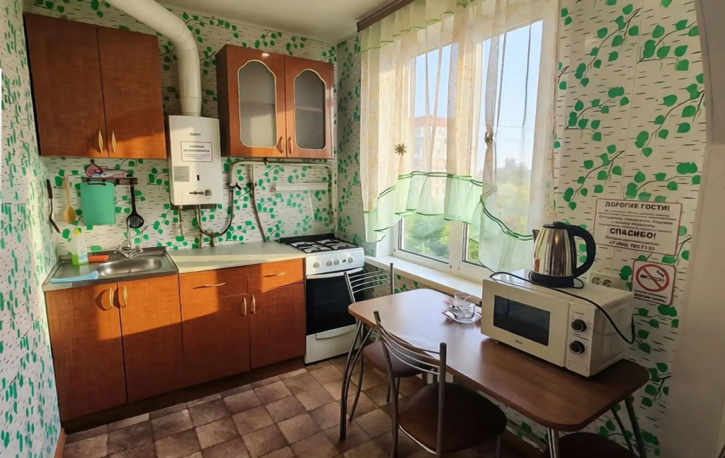 Квартира Лаконичная студия с балконом