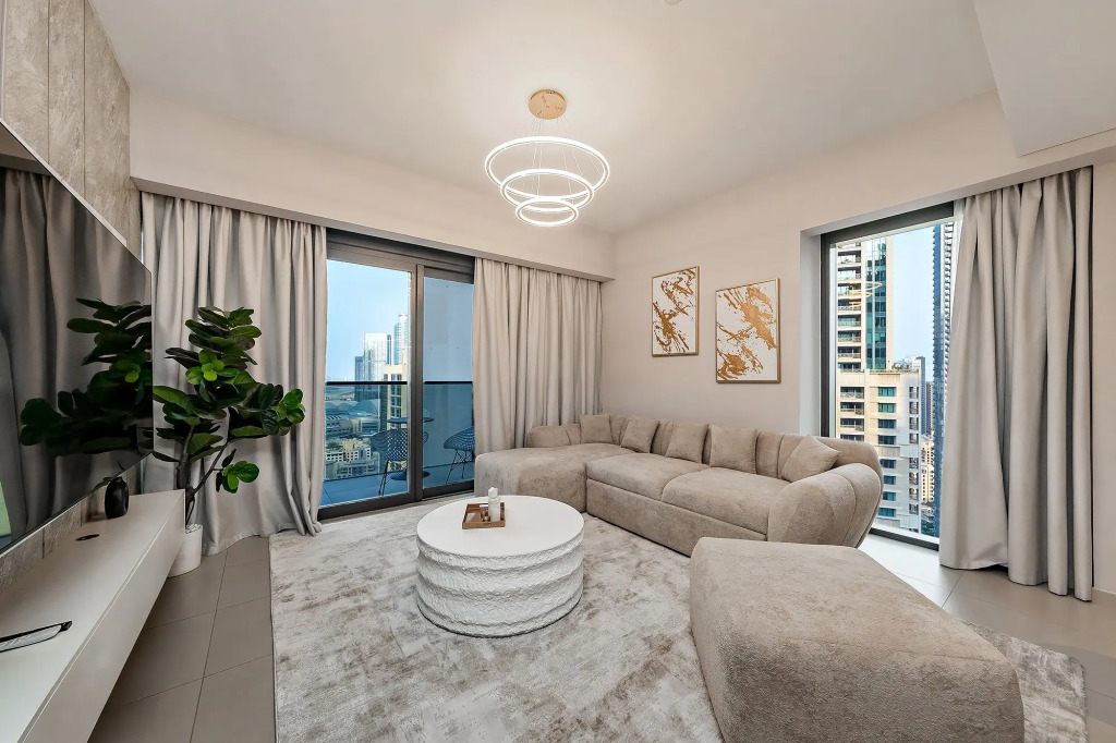 Апартаменты Burj View Stylish 3BR + Maids Room in Act One Tower Downtown