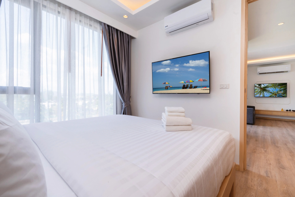 Отель Aristo Beach Resort condo by Roominger