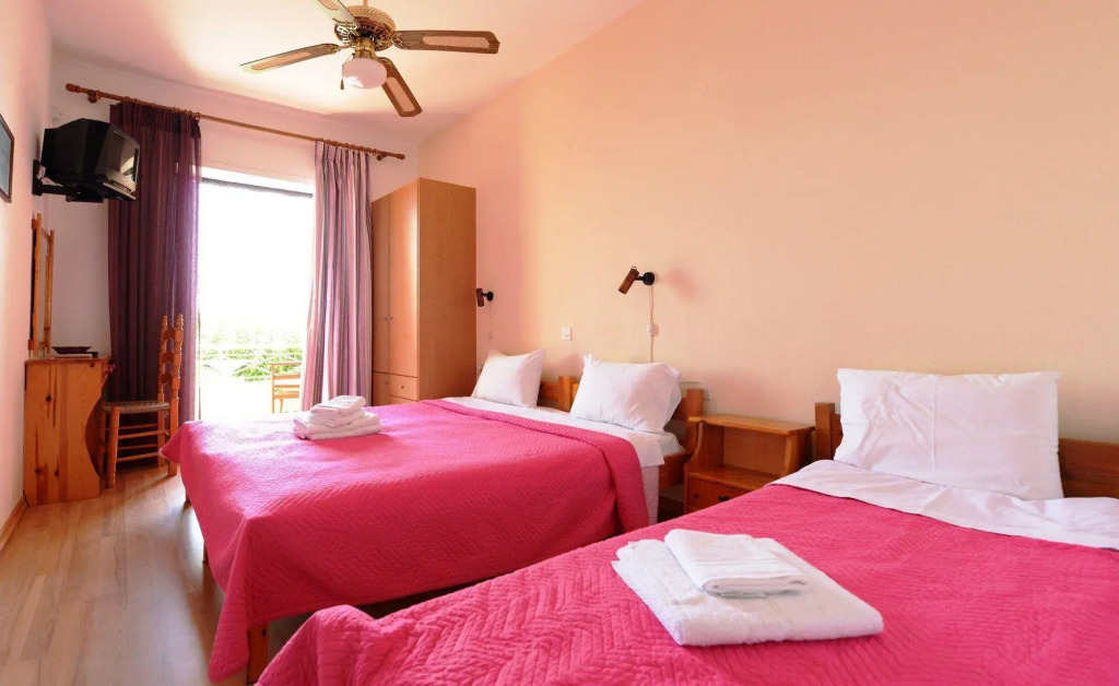 Отель Pharos Rooms