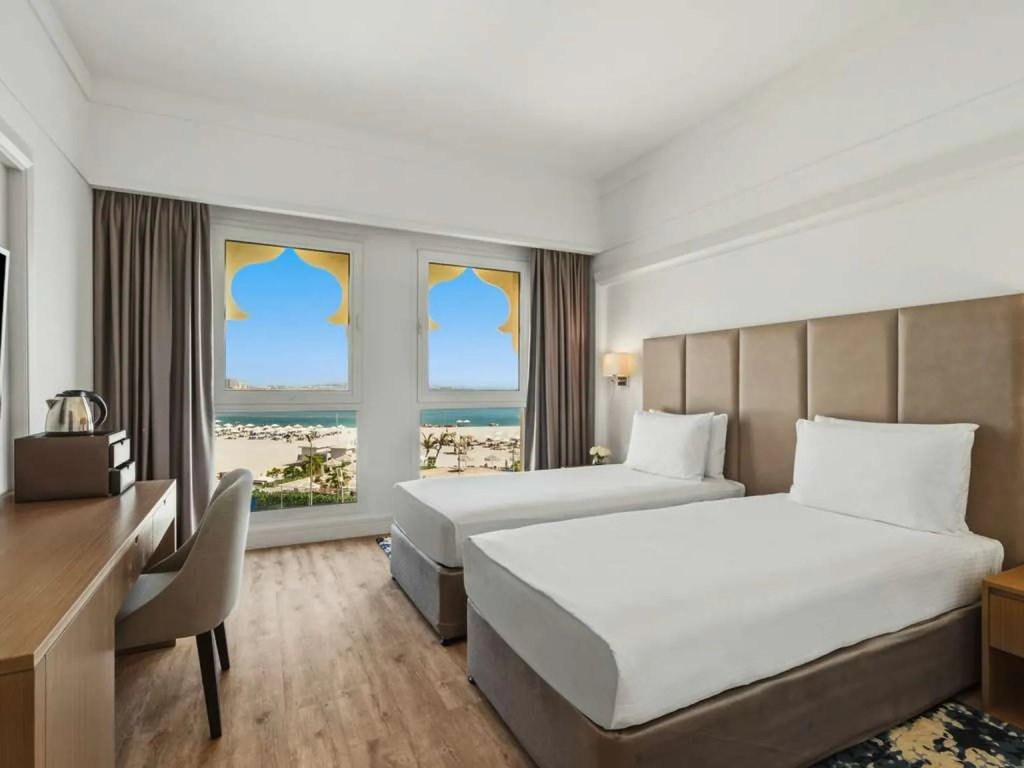 Двухместный номер Deluxe with pool or sea view (2 отдельные кровати)