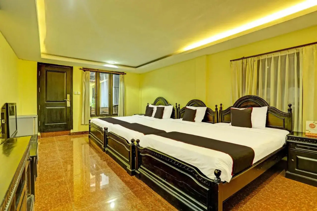Collection O 91081 New Arena Hotel
