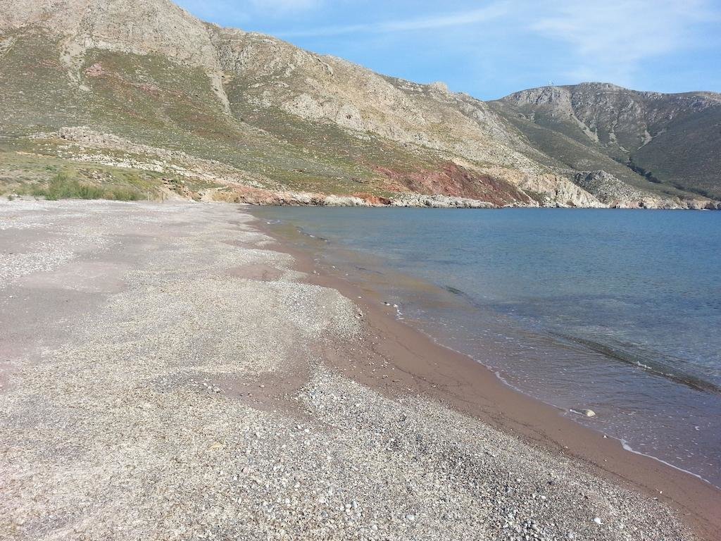 Photo of Eristos beach with turquoise pure water surface