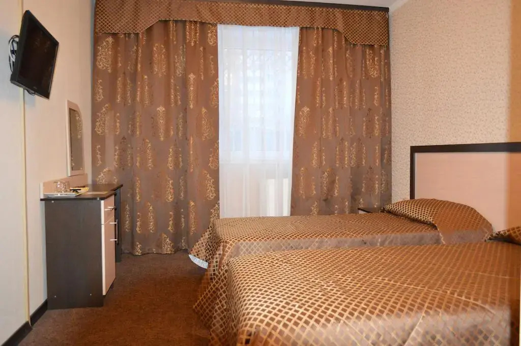 Отель Рич