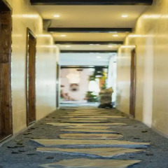 Отель Zaimushe Holiday Courtyard интерьер отеля