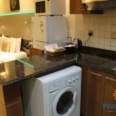 Отель Pearl Park Inn удобства в номере