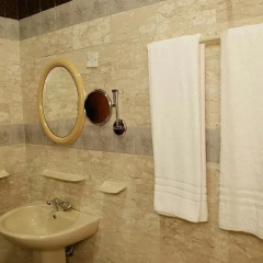Manna Heights Hotel & Conference Centre ванная