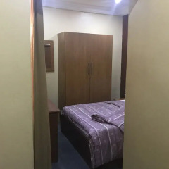 Отель Grand Riviera Suites Энугу комната для гостей