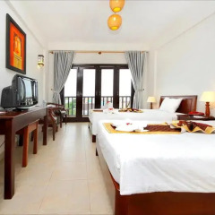 Sunshine Hotel Хойан в номере
