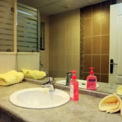 Апартаменты Eco Friendly Furnished Apartments ванная