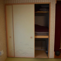 Отель Fukuroutei сейф в номере