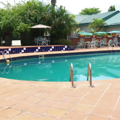 Отель Jacaranda Suites Нигерия, Калабар - отзывы, цены и фото номеров - забронировать отель Jacaranda Suites онлайн бассейн фото 3