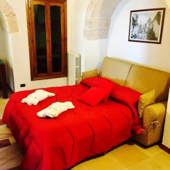 Отель Trulli Vacanze in Puglia Альберобелло комната для гостей фото 2