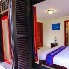 Отель Harmony Homestay сейф в номере