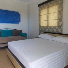 Отель Studios Villa Vasili сейф в номере