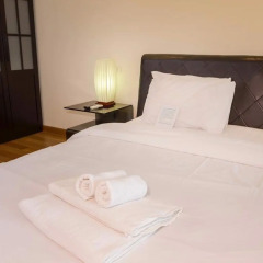Апартаменты Emerald Palace Serviced Apartment Паттайя комната для гостей