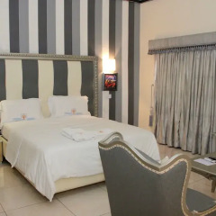 Отель Calabar Harbour Resort SPA Нигерия, Калабар - отзывы, цены и фото номеров - забронировать отель Calabar Harbour Resort SPA онлайн комната для гостей фото 5