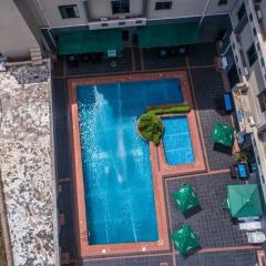 Отель Adig Suites Энугу