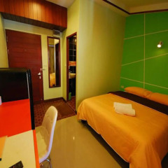 Отель The Palm Delight Guesthouse удобства в номере
