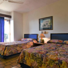 Hotel Suites del Sol Пуэрто-Вальярта комната для гостей