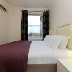 Апартаменты Q Kensington Two Apartments комната для гостей