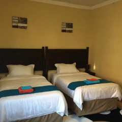 Отель Skyhawk Guesthouse Ботсвана, Габороне - отзывы, цены и фото номеров - забронировать отель Skyhawk Guesthouse онлайн комната для гостей фото 5