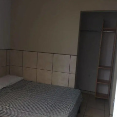 Hotel Centro Médico комната для гостей