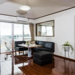 Отель Ocean View Condominium Томигусуку комната для гостей фото 5