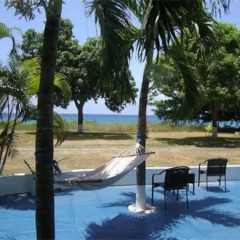 Отель By The Sea Vacation Home And Villa бассейн