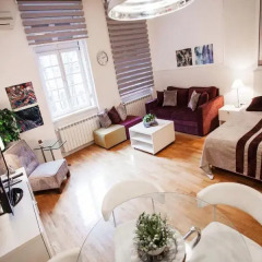Апартаменты Studio Glam & Chic комната для гостей фото 3