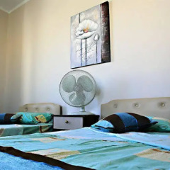 Отель Reno's Guest House в номере фото 2