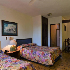 Hotel Suites del Sol Пуэрто-Вальярта комната для гостей фото 4