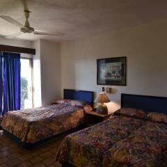 Hotel Suites del Sol Пуэрто-Вальярта комната для гостей фото 3