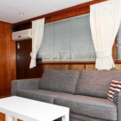Отель Dutch Canal Boat Нидерланды, Амстердам - отзывы, цены и фото номеров - забронировать отель Dutch Canal Boat онлайн комната для гостей фото 3