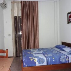 Отель Tani's Guesthouse комната для гостей