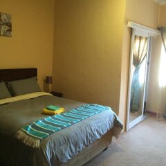 Отель Skyhawk Guesthouse Ботсвана, Габороне - отзывы, цены и фото номеров - забронировать отель Skyhawk Guesthouse онлайн комната для гостей