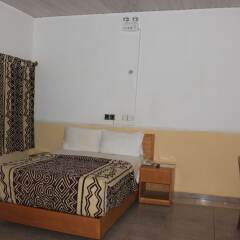 Отель Jacaranda Suites Нигерия, Калабар - отзывы, цены и фото номеров - забронировать отель Jacaranda Suites онлайн комната для гостей фото 3
