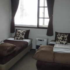 Отель Hakuba Powder Lodge Хакуба комната для гостей