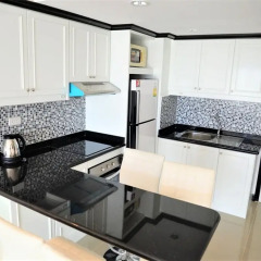 Отель Stylish 2 bed Condo Jomtien Паттайя в номере