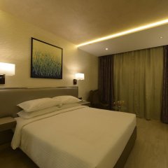 Genesis Hotel Near Mumbai Airport in Mumbai, India from 83$, photos, reviews - zenhotels.com guestroom